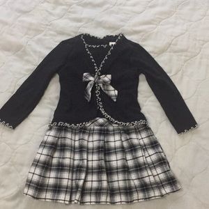 Cute dress with pleated skirt.